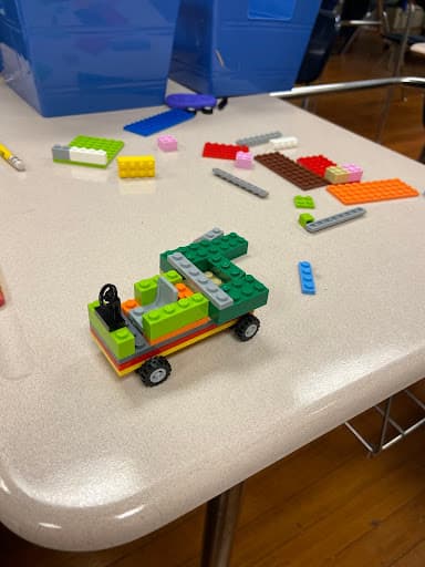 ReachOut members leading STEM activities with students